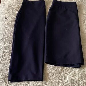 In excellent condition 2 black Women's Midi Skirt